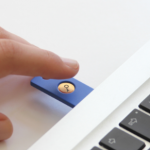 image of a laptop with a usb drive 